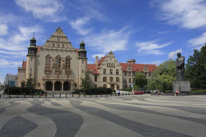 Main Univeristy building - Collegium Minus - on a sunny day, under the bright blue sky