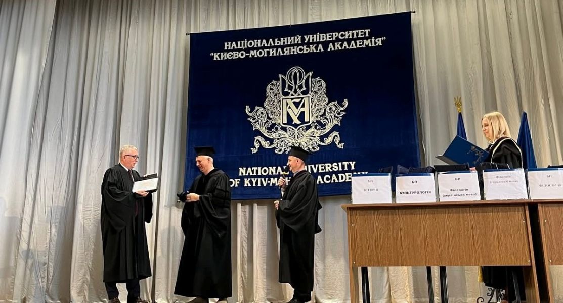 The picture shows the ceremony of presenting the Honorary Doctorate of Ukrainian National University of Kyiv-Mohyla Academy to prof. Rafał Witkowski