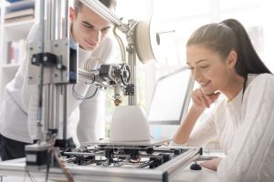 The graphic shows two students in the lab, conducting a research together