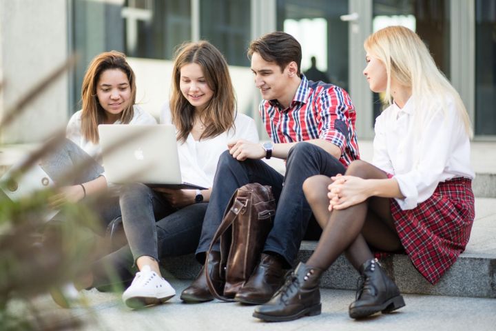 Group of students in front of the AMU building
