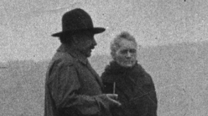 Black and white photograph of Marie Skłodowska-Curie and Albert Einstein